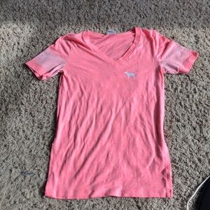 The pink brand short sleeve shirt the color pink